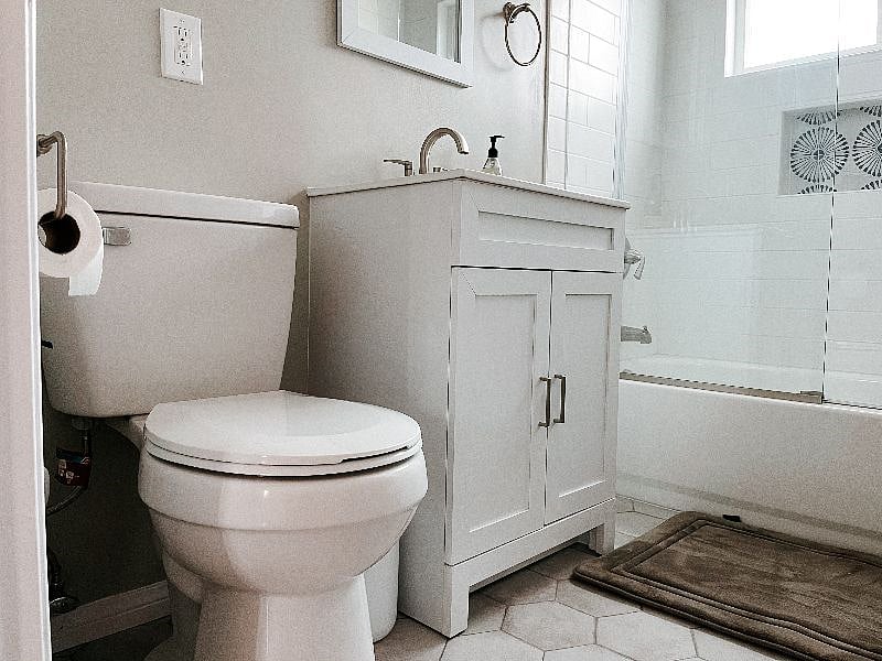 Storage cart next to vanity for blow dryer etc.