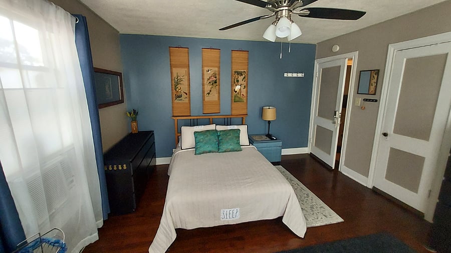 Queen bed with linens