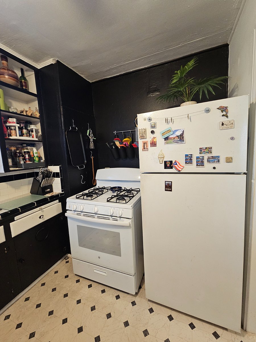 Gas stove and full size refrigerator.