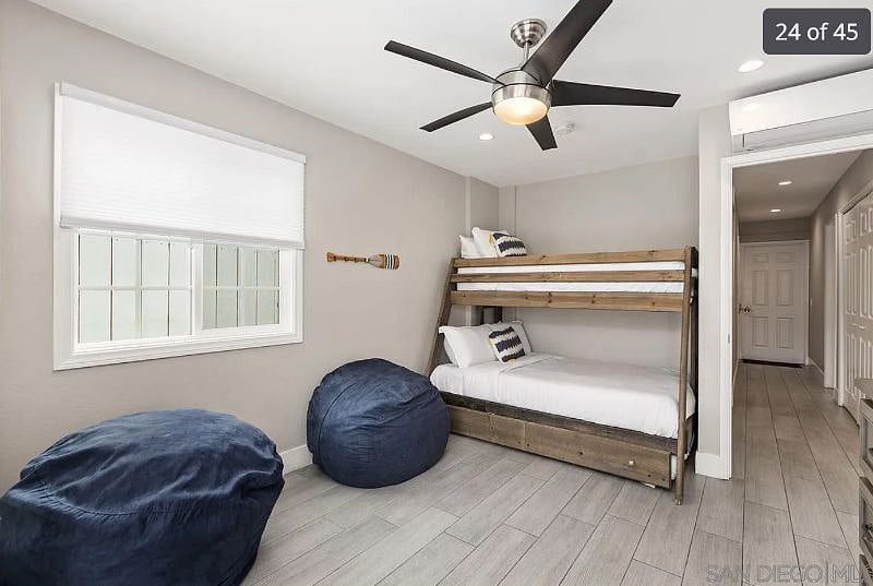 Bunk beds (bedroom 2) Per the bunk beds, the top mattress is a twin and the bottom mattress a queen. The bunk bed also includes a twin trundle bed underneath. Smart TV and mini-split in room.