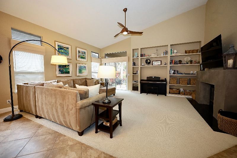 Family room with smart tv and game console and comfy seating