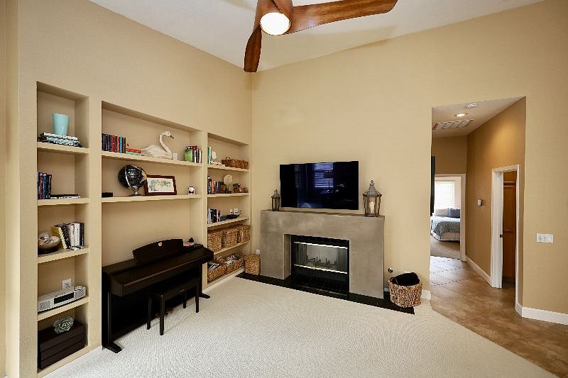 Books, electric piano, smart tv