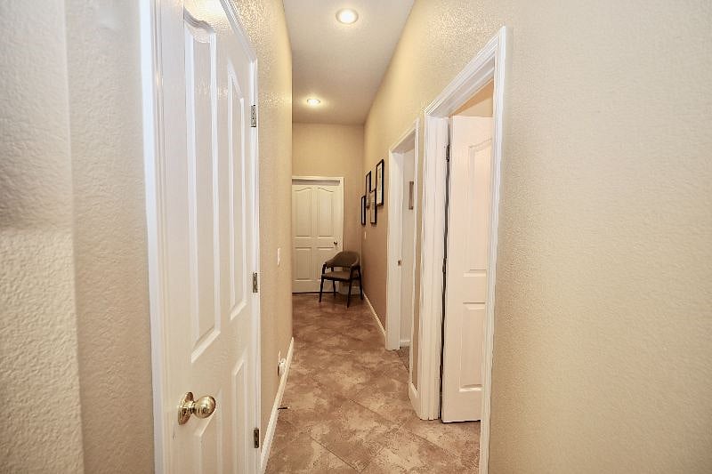 Hallway to Bedroom 1, Bath, and Bedroom 2