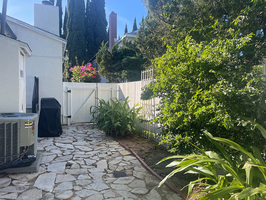 This is the private yard for this suite. Access is the stairs to the left.