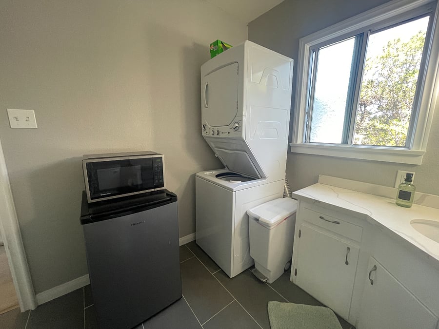 Newer GE stack washer/dryer, microwave, and mini fridge just for you!