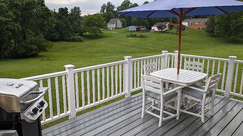 Deck overlooking quiet back yard