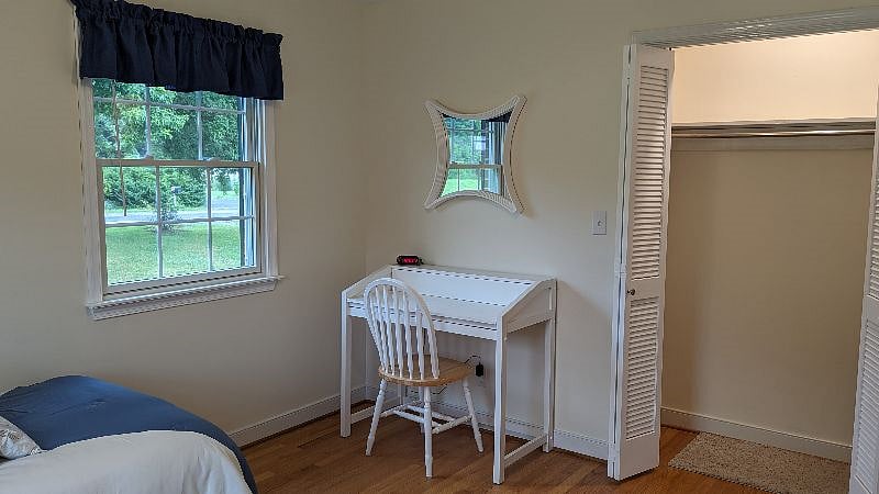 Main level second bedroom with lighted closet