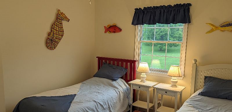 Main level second bedroom with comfy twin beds