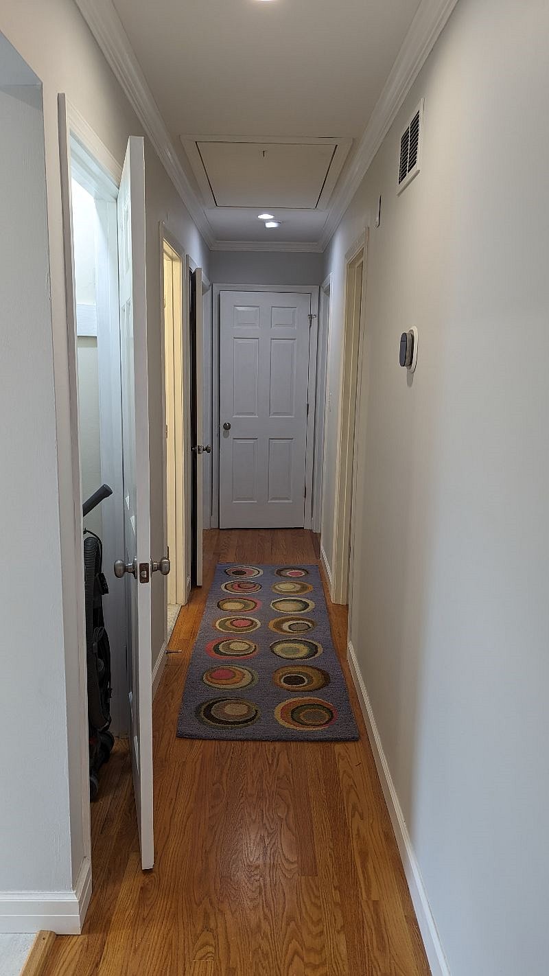 Main level hall with 3 closets