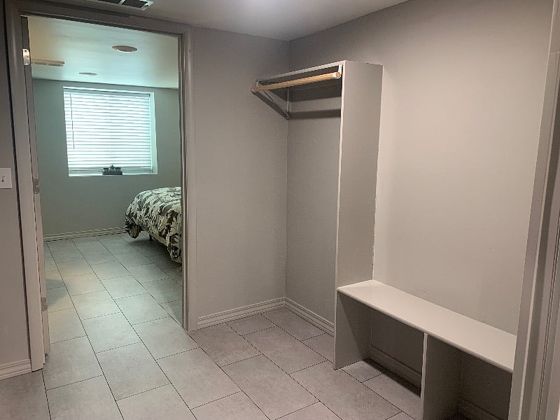 Drop zone for your shoes, bags and coats just off the bedroom.