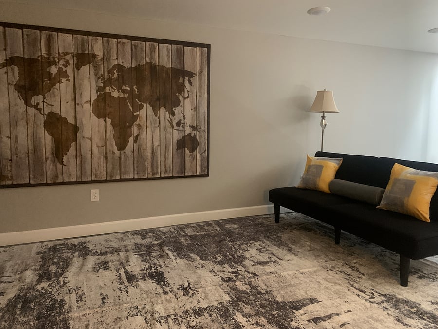 New futon couch, area rug (both shown) and coffee table (not pictured) added within last 6 months.