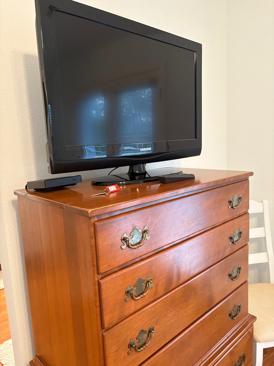 TV on 6 drawer dresser.