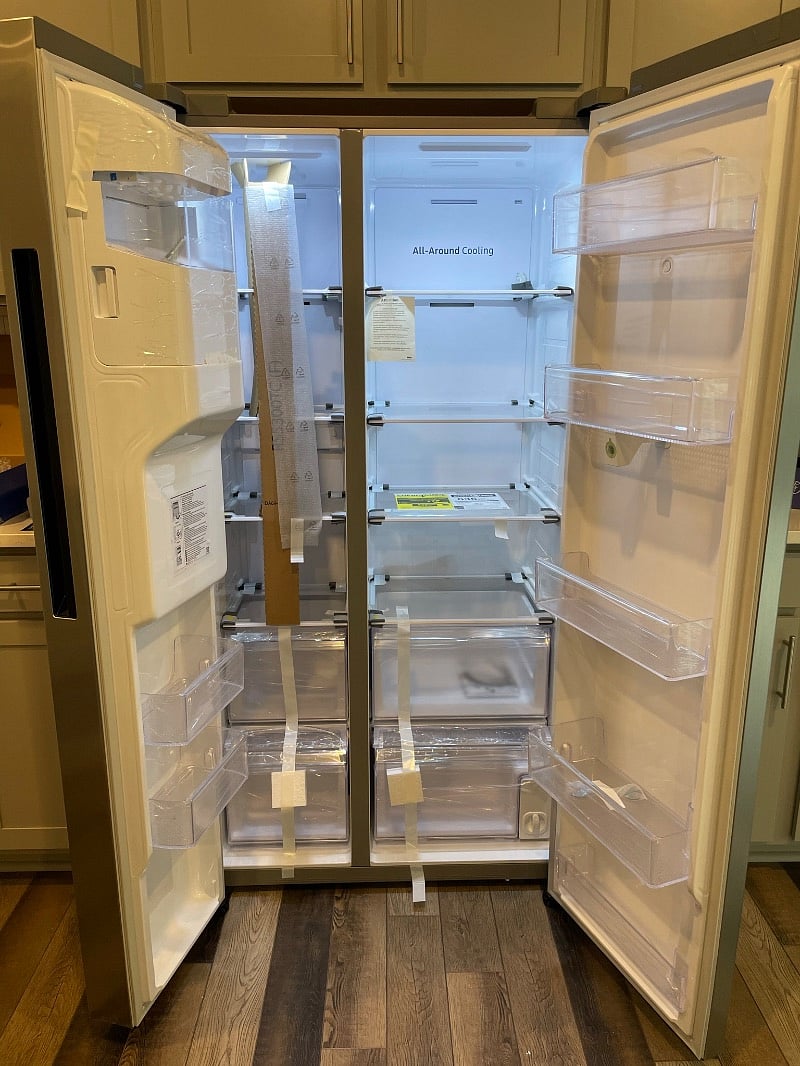 Brand new smart-home refrigerator with water filter and ice maker