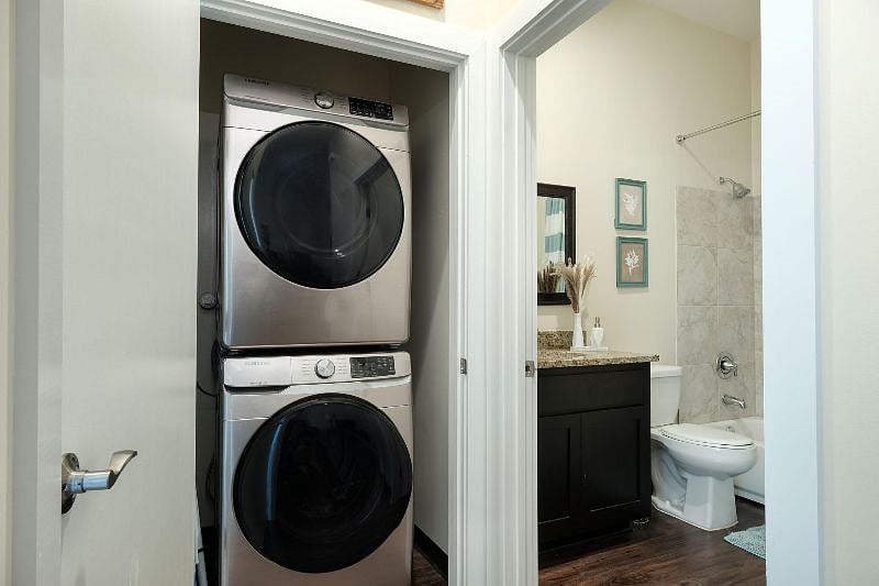 Brand new washer and dryer - laundry detergent, iron and ironing board provided