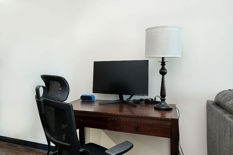 Brand new 27 Samsung monitor with HDMI cable and adapter to plug into your laptop. High speed internet (download speed 420mbps). Ergonomic swivel desk chair. Youll find an extension cord in the drawer.