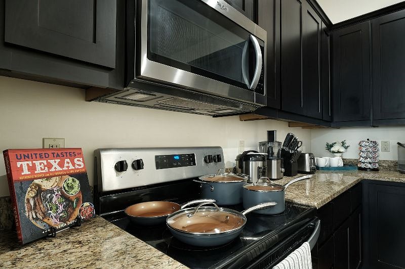 Kitchen is well stocked with everything you need to cook and entertain! Sharp knives, brand new set of ceramic pots and pans, toaster, Keurig K-cafe machine and pods to make coffee, cappuccinos and lattes, food processor, rice cooker, microwave.
