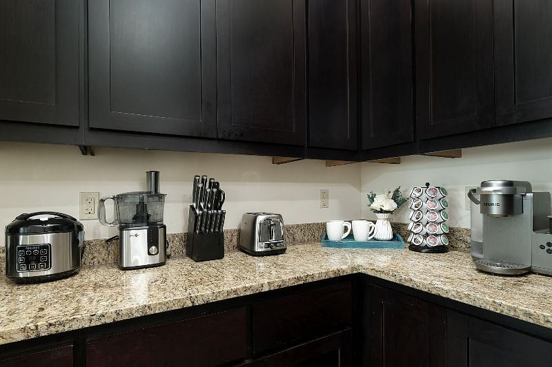 Kitchen is well stocked with everything you need to cook and entertain! Sharp knives, brand new set of ceramic pots and pans, toaster, Keurig K-cafe machine and pods to make coffee, cappuccinos and lattes, food processor, rice cooker, microwave.
