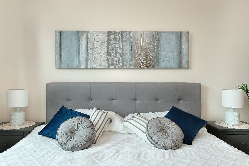 Bedroom #1: Large window provides lots of natural light and blackout curtains keep the room dark until youre ready to get up! Super comfy king bed. Closet space with lots of hangers and en suite bathroom.
