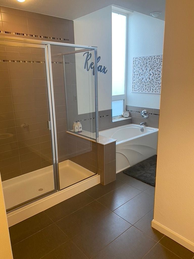 Large Master bath with two sinks, shower and large soaking tub