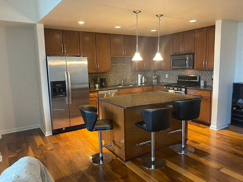 Granite Countertops with Bar seating for 3