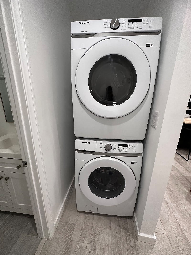 The unit includes a full size stackable washer/dryer in-unit.
A full size ironing board and iron are provided and stored in the bedroom closet.