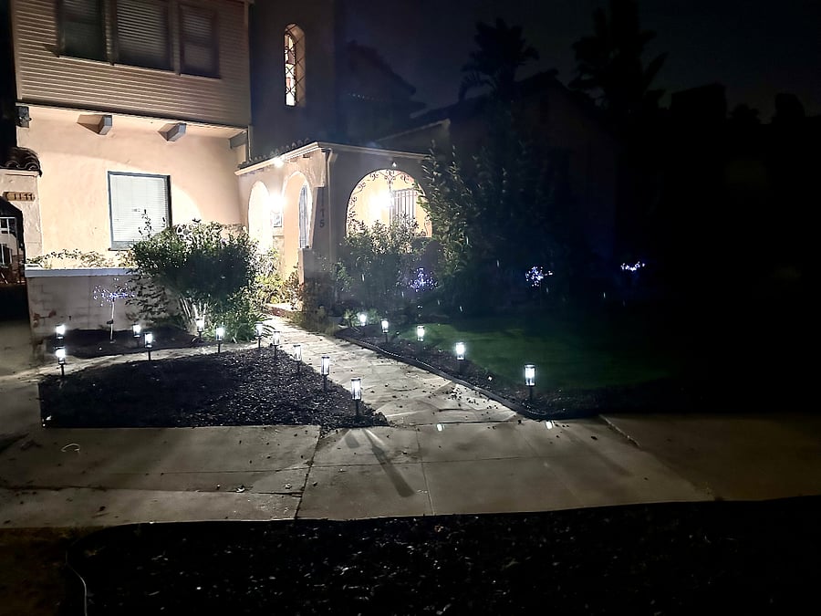 Night time view of the front of the occupied primary residence.