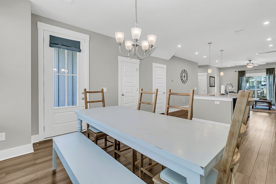 Enjoy meals at the beautiful marble eat-in island, able to seat 3. Additional dining space at the large 6-person dining table.