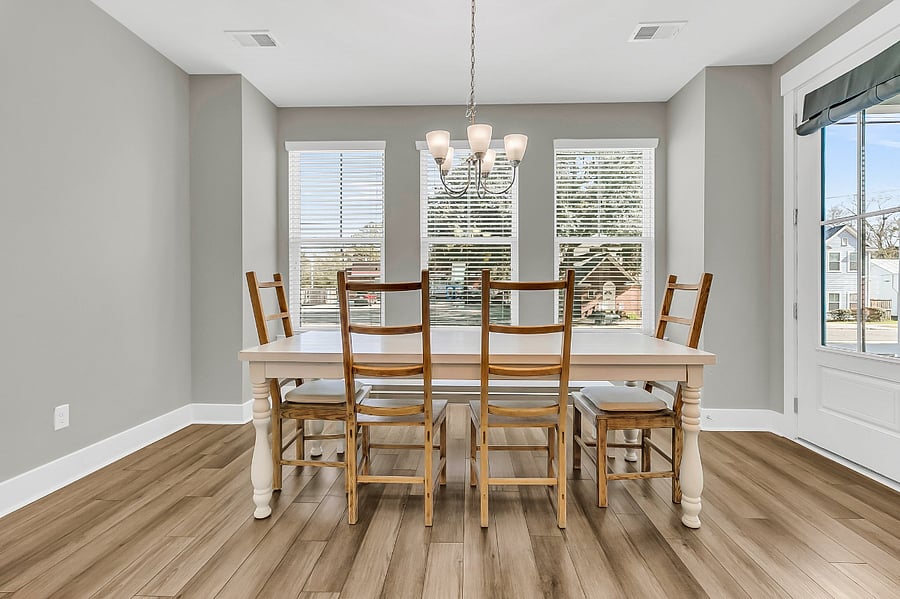 Enjoy meals at the beautiful marble eat-in island, able to seat 3. Additional dining space at the large 6-person dining table.