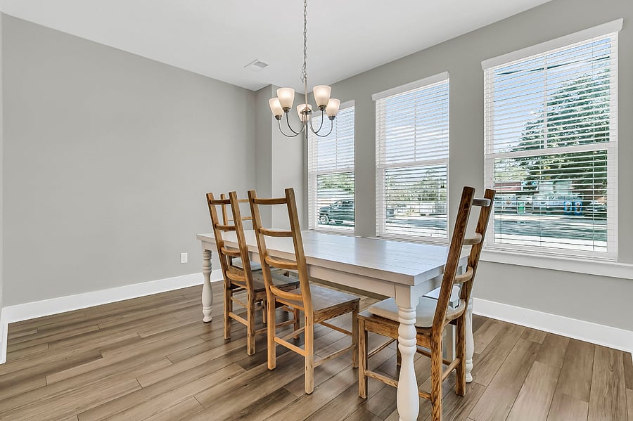 Enjoy meals at the beautiful marble eat-in island, able to seat 3. Additional dining space at the large 6-person dining table.
