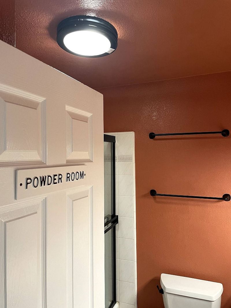 Full bathroom with a shower, bathtub and good ventilation.