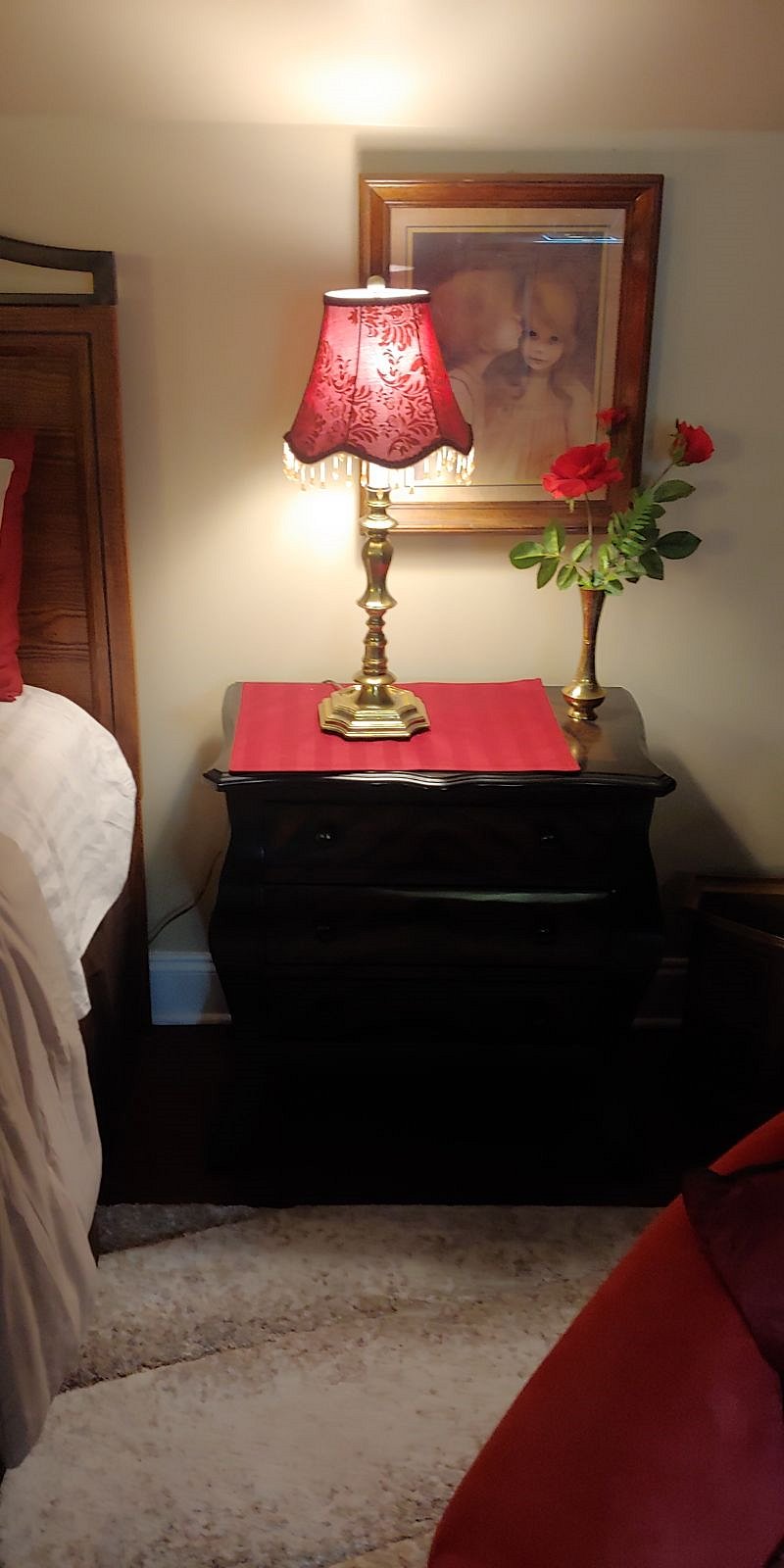 Right nightstand in bedroom.