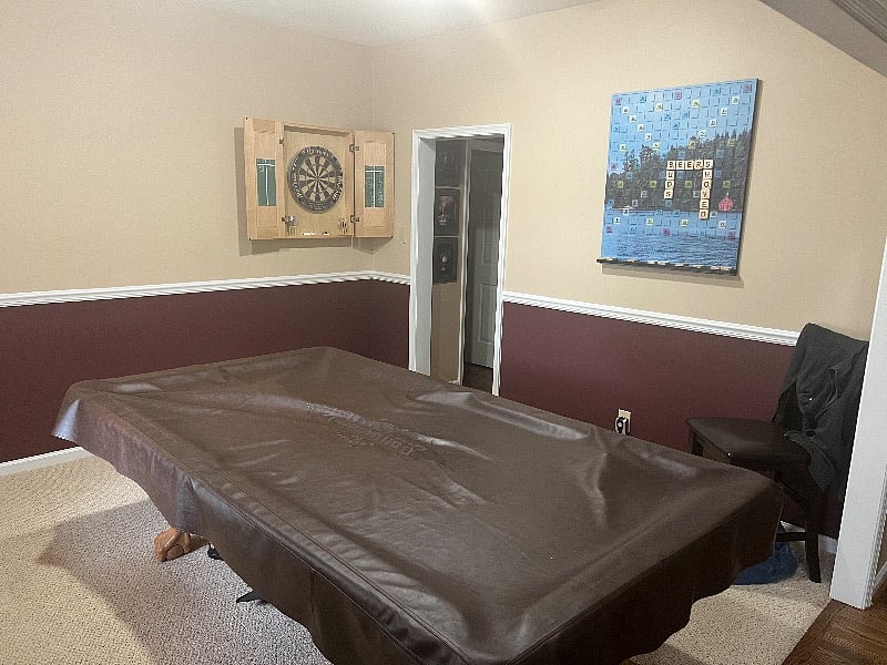 Front entrance to my home and yes that is a pool table, scrabble and darts.