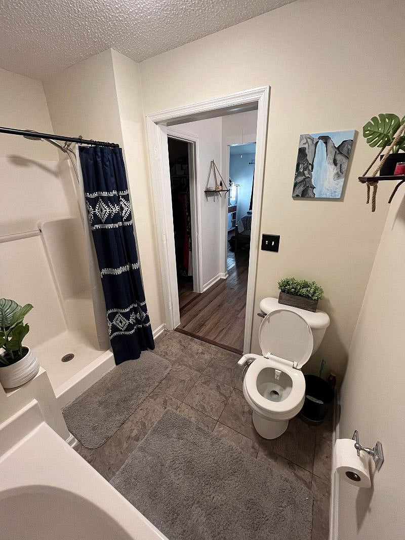 - Master Bathroom (View Towards Bedroom & Walk-in Closet) -