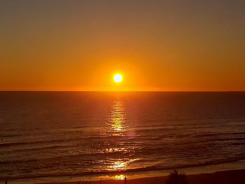Watching Beautiful morning sunrise from our balcony
