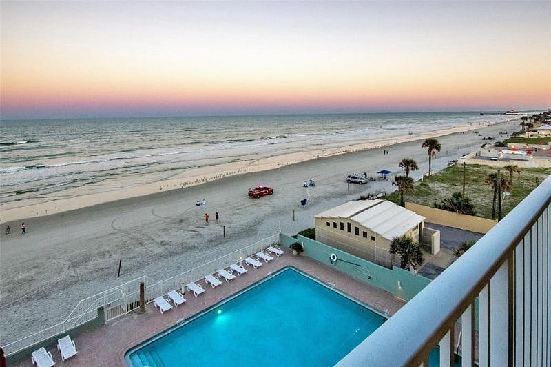 Closed for repair - Oceanfront  Pool looking out to a beautiful Atlantic Ocean and beaches before nightfall.