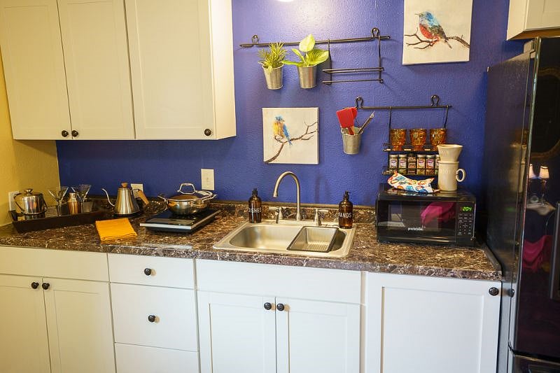 The cute little kitchenette comes with a microwave, countertop burner and a full size refridgerator.