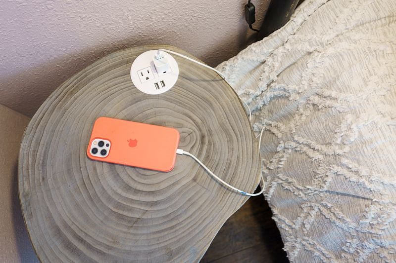 The bad tables come equiped with plugs and USP ports for your alarm clock and phone