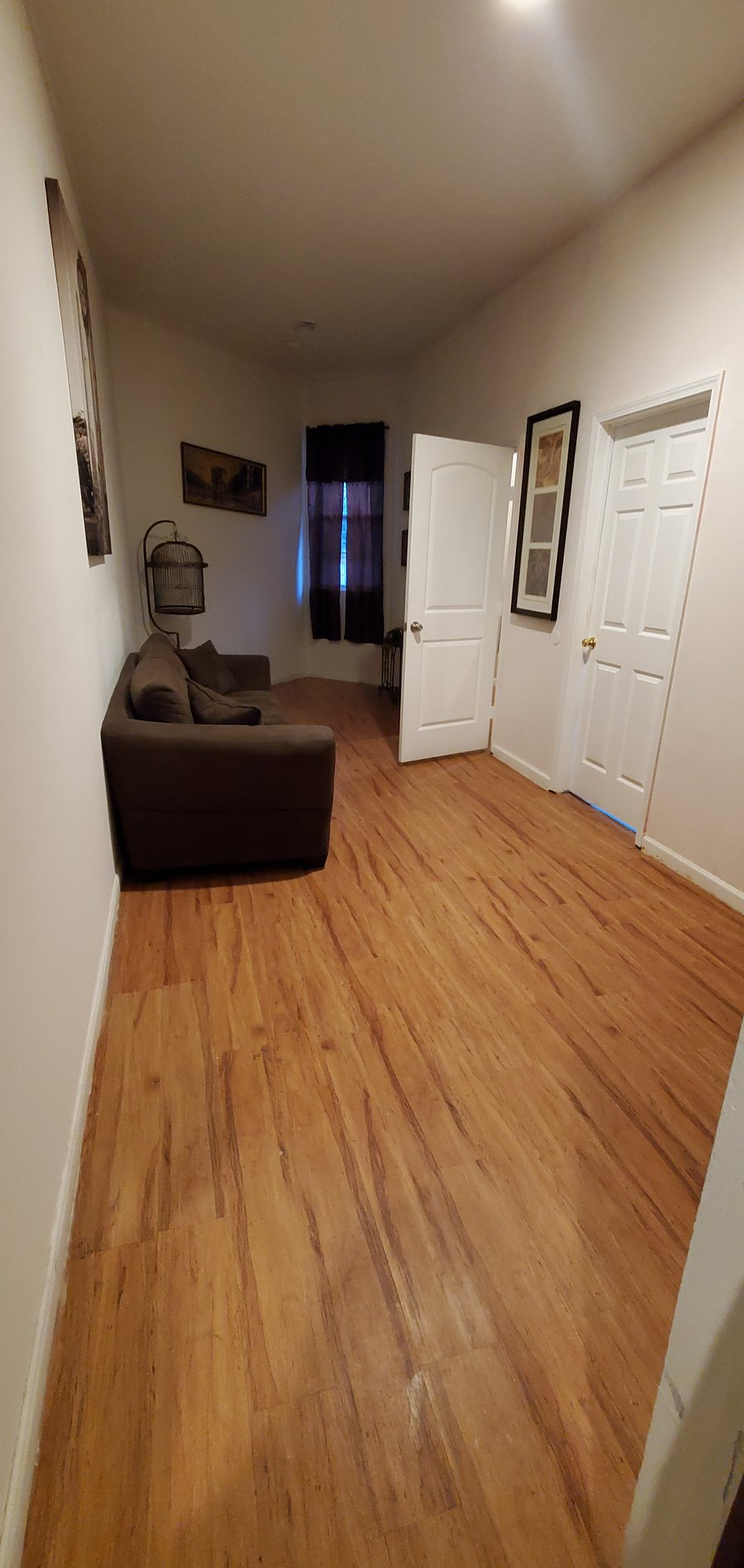 SECOND SITTING AREA FOR COMFY ROOMMATE CONVENTIONS OR SHARING STORIES.