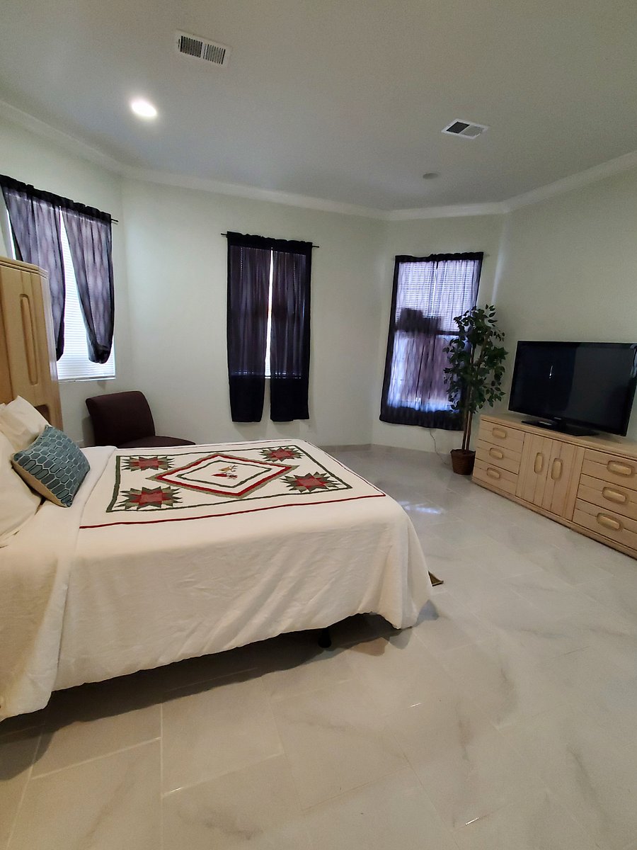 Room #1
Queen size bed with plenty of storage, shelves, cabinets, nightstands and dresser to accommodate all your needs.
52" smart TV.