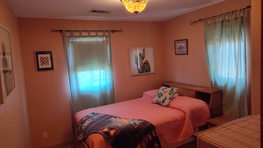 2nd bedroom with full bed and dresser