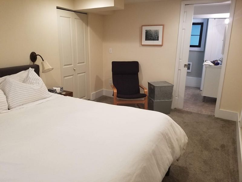 Bedroom also has a large dresser, not pictured