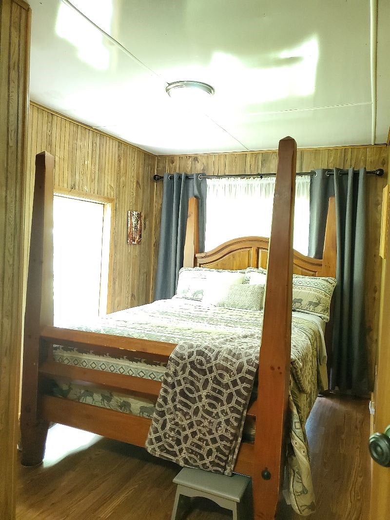 1st bed room to right as you come in the door. Features View of the Lake, Queen Bed, Full Dresser Nightstands and closet