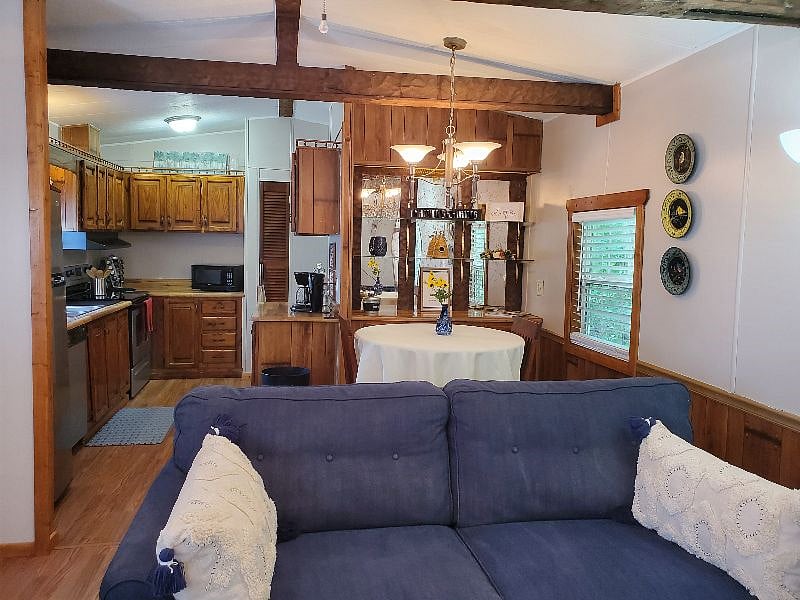 Open to the kitchen dining room and Living room. All new wood floors, wood blinds freshly painted.