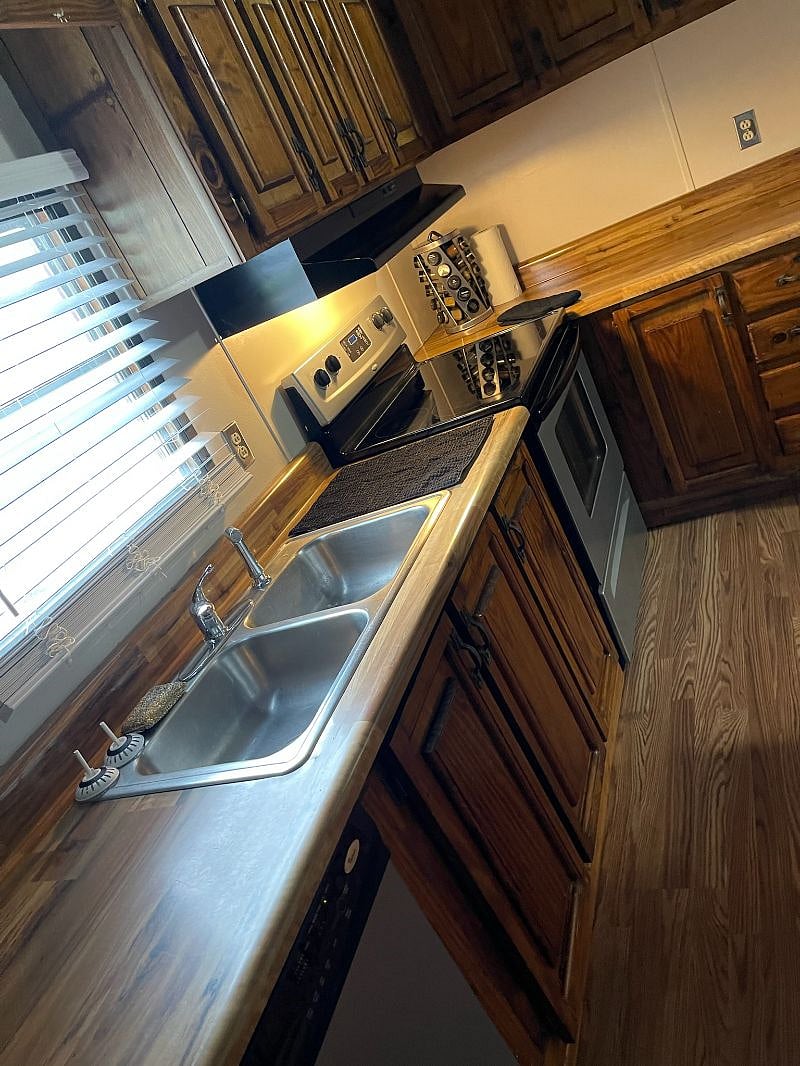 All pots, pans, coffee pot, Crock pot, utensils, baking pans, dishes, & cups all ready for you!