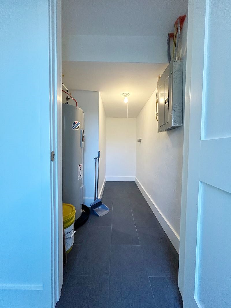 Utility/Storage room right off entry foyer.