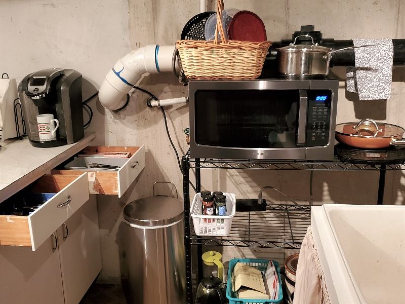 Convection oven/air-fryer/microwave combo, hot plate, cookware, coffee maker and dishes provided.