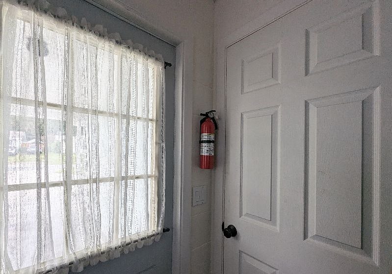  Fire extinguishers in the laundry room.