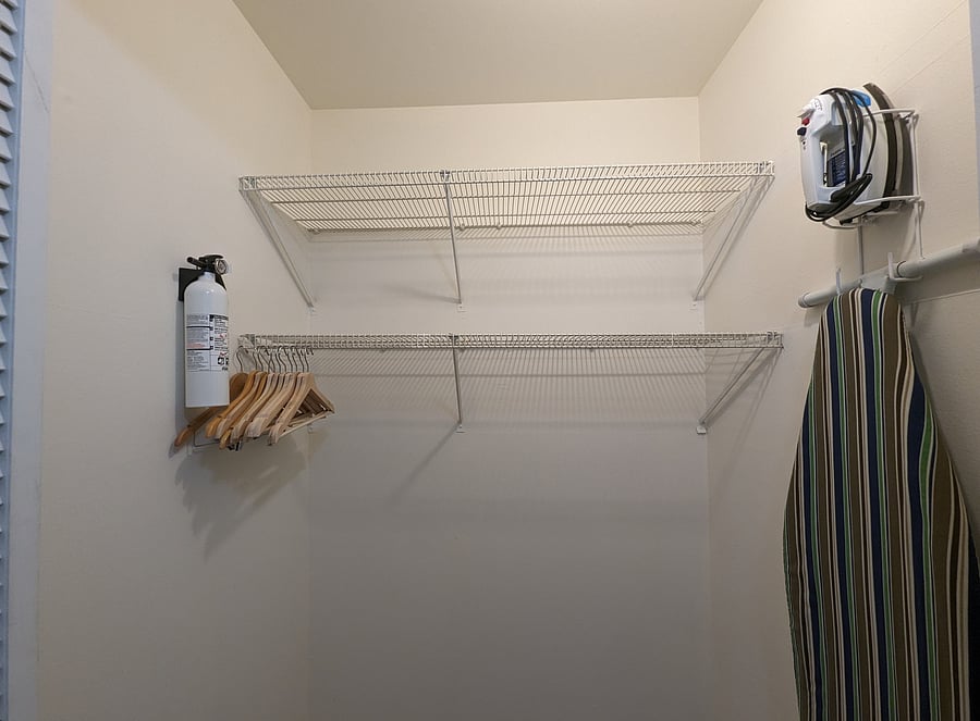 Fire extinguishers in the hallway closet.