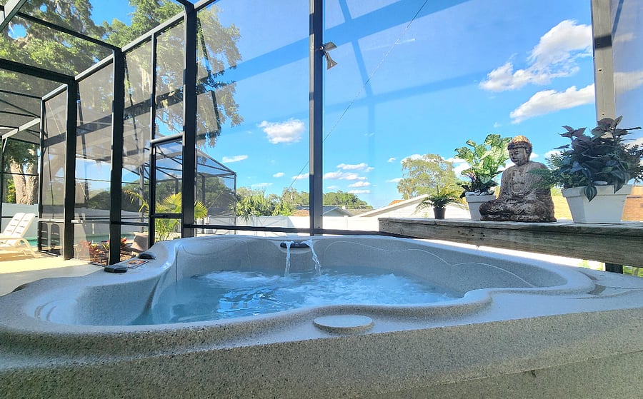 An inviting outdoor living space complete with a relaxing spa, perfect for unwinding in the comfort of your own backyard.