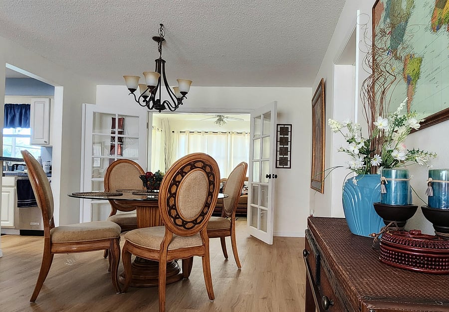 Enjoy cozy conversations around our glass round table.  